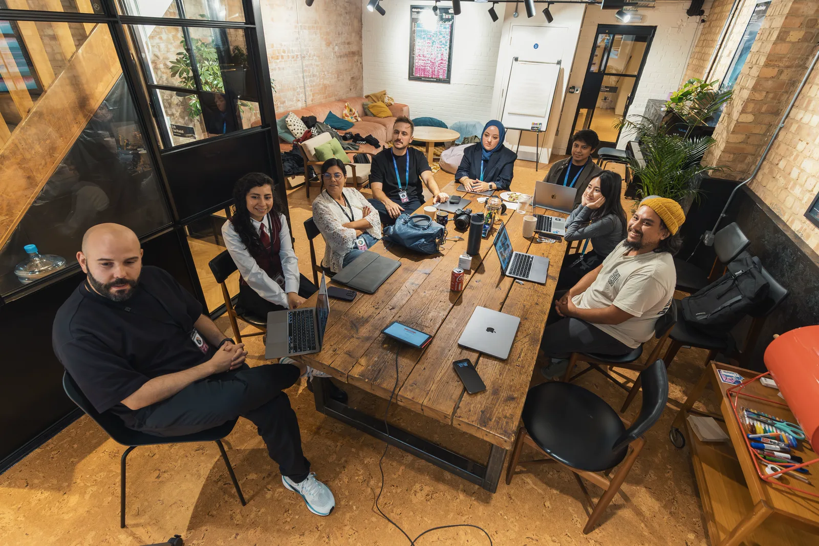 A diverse team collaborating around a table
